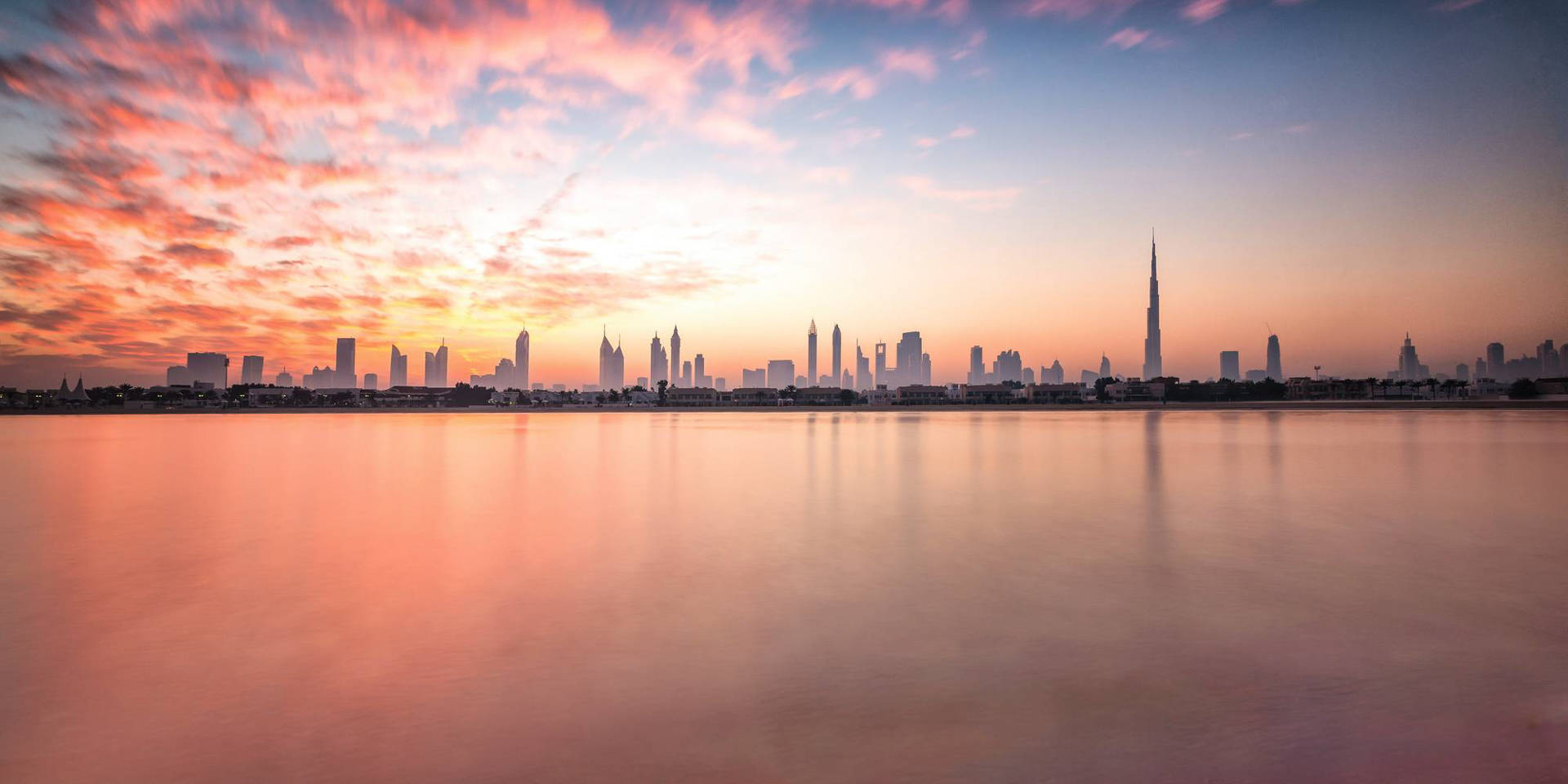 500px Photo ID: 62460025 - I've been through Dubai many times, but never had left the airport. This latest trip I thought I would spend a day in Dubai and venture out to see a bit of the city. I caught this sunrise from Jumeira Beach.