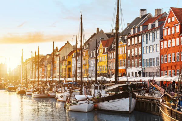 514923290 Colorful houses in Copenhagen old town at sunset