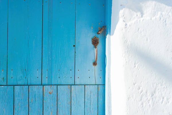 941935870 Blue door in Santorini